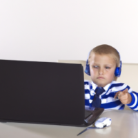 I need one generate picture office boy with laptop and desk 