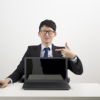 I need one generate picture office boy with laptop and desk age 30 years with office clothing 